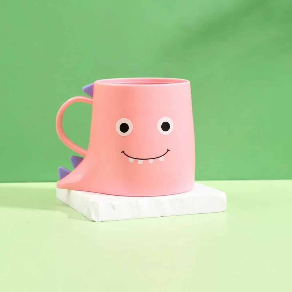 Pink cartoon-like mug with a smiley face on a green background