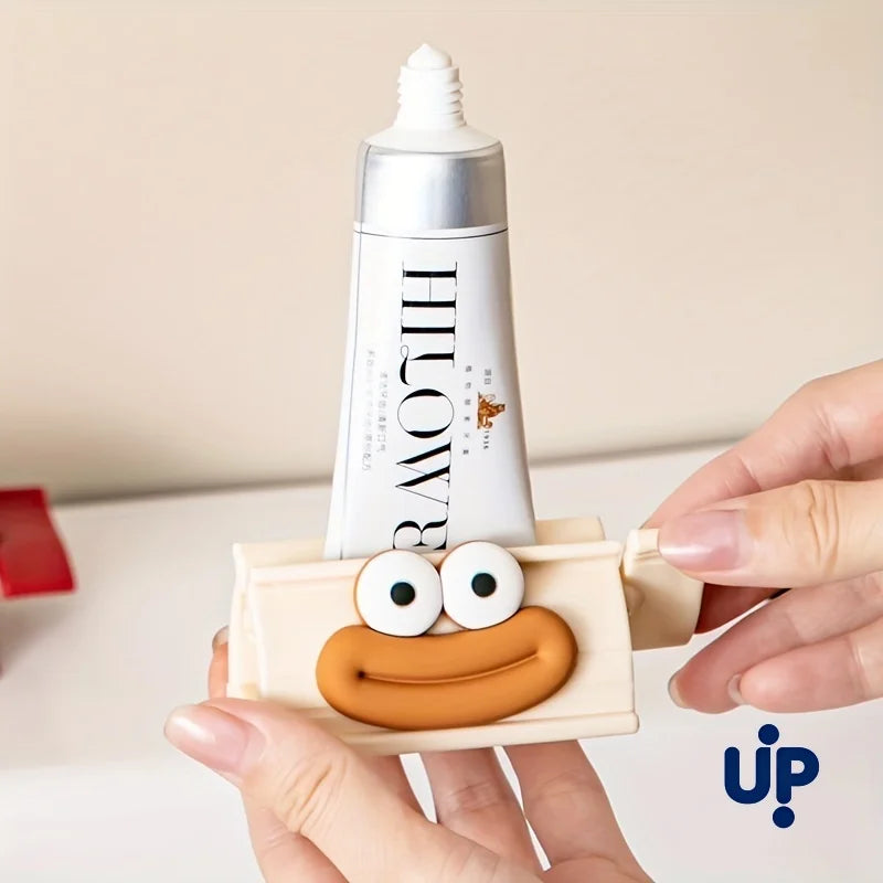 Person holding a tube of toothpaste with a cartoon face on a beige background